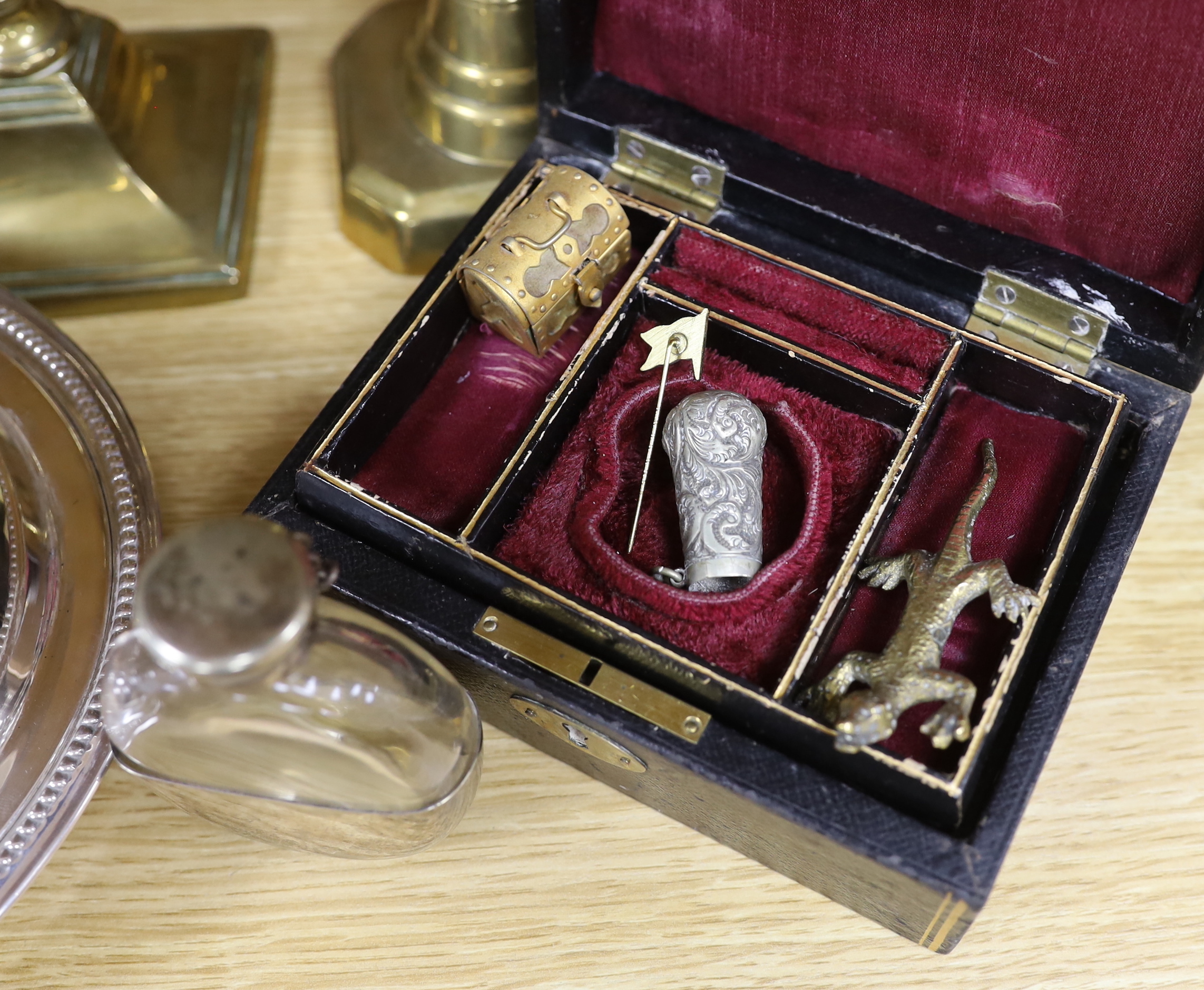 Four pairs of brass candlesticks, silver plated tureen and cover and a leather jewellery box with sundry collectibles